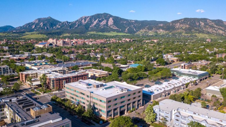 Aerial view of Boulder, Colorado with mountains in the