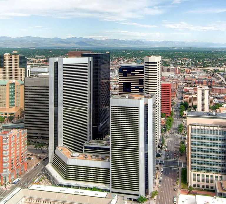 Downtown Denver skyline with skyscrapers and distant
